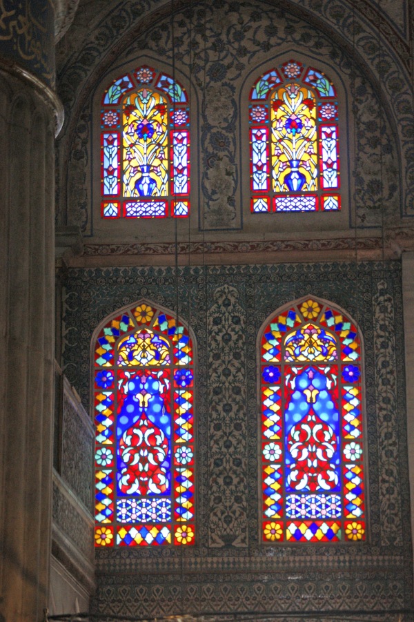 Decorative stained glass windows inside the Blue Mosque