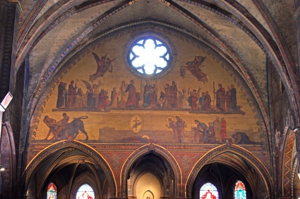 The painted tableau over the altar showing the martyrdom of St Sernin is from the 19th century